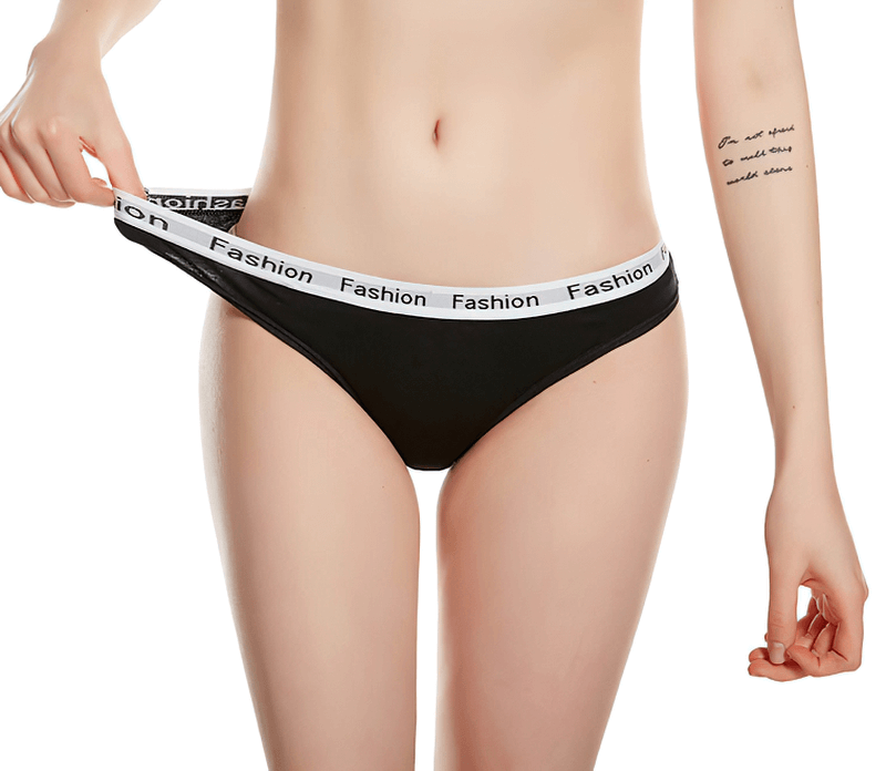 Woman wearing black cotton sports briefs with elastic waistband, showcasing comfortable fit and flexibility for active wear.